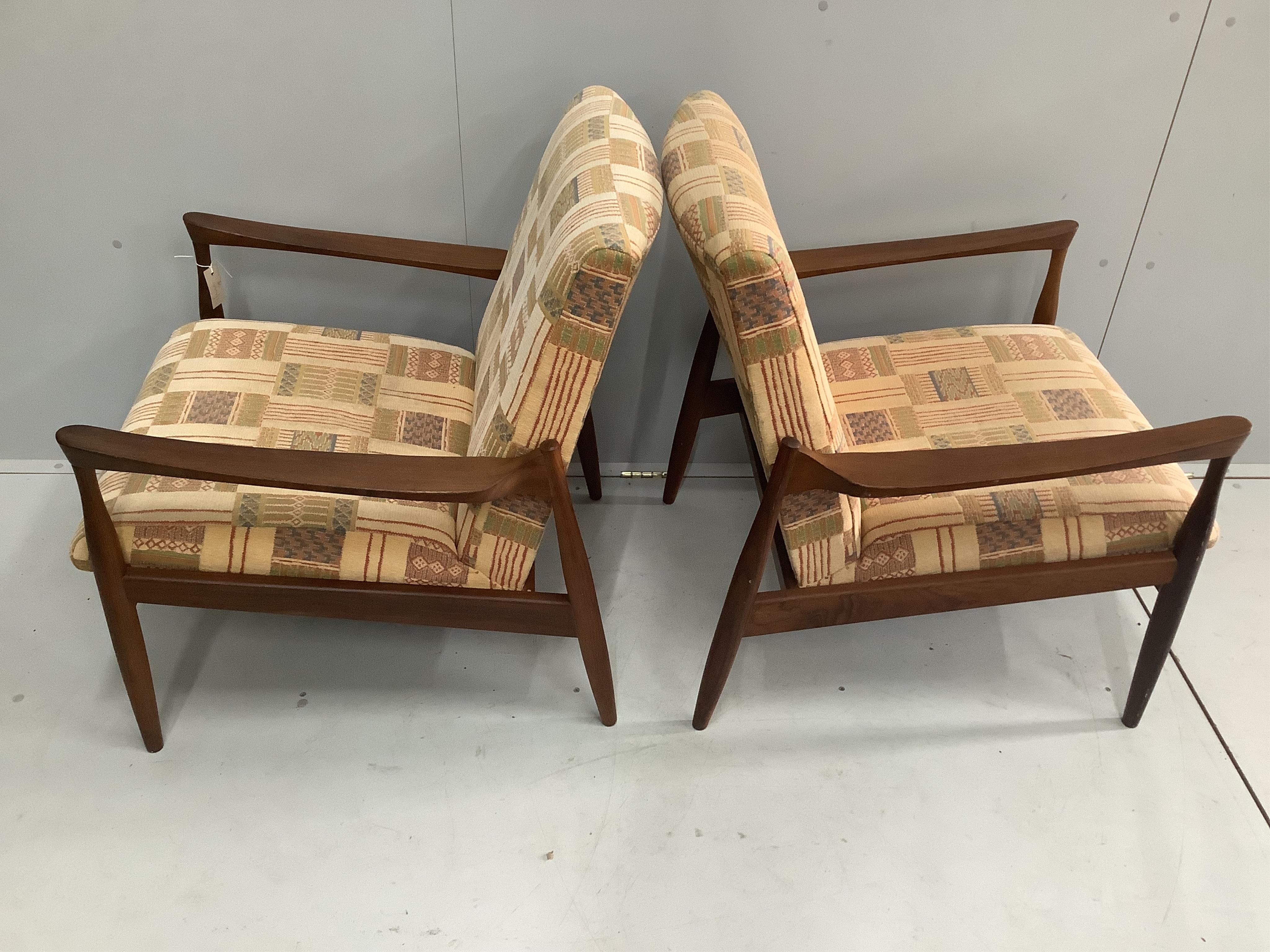 I.B. Kofod Larsen for G-Plan, a pair of mid century Danish design teak armchairs, width 69cm, depth 70cm, height 82cm. Condition - good